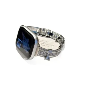 Rhinestone bow smartwatch strap compatible with Apple Watch Series 10 9 8 SE shiny metal band.