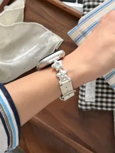 Bracelet de montre en cuir véritable avec breloques étoiles argentées pour Apple Watch, chic.