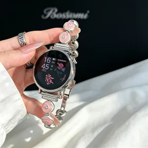 Stainless steel metal watch strap with pink epoxy clover charms for smartwatches.