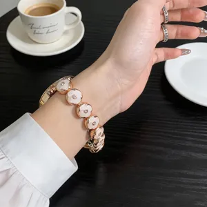 Metal four-leaf clover watch strap compatible with Apple Samsung Huawei Xiaomi smartwatches.