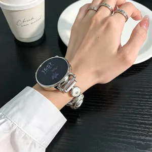 Silver metal watch strap featuring clover flower charms, compatible with smartwatches, detail view