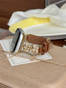 Bracelet de montre en cuir de rechange avec breloques étoile en cristal pour Apple Watch.