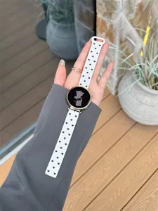 White silicone heart pattern smartwatch strap detail view, compatible with devices.