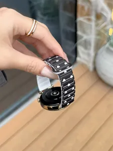 Black silicone smartwatch strap featuring white spade patterns for stylish daily wear.