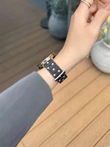 Silicone watch strap with cute white heart pattern, flexible and comfortable for daily wear.