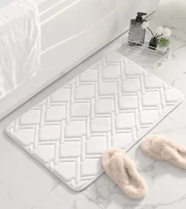 Tappeto da bagno antiscivolo bianco a rimbalzo lento con elegante design a griglia.
