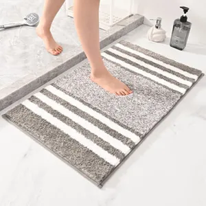 Alfombra de baño de microfibra con diseño a rayas modernas, suave absorbente y antideslizante.
