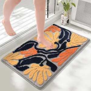 Detailed view of the fluffy absorbent bath mat in use, showing soft texture and backing.