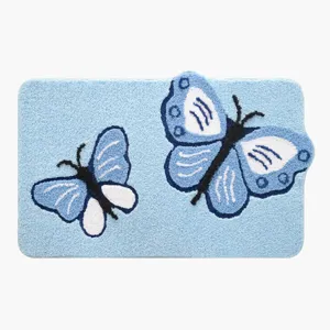 Alfombra de suelo de mariposa copetuda azul antideslizante absorbente para dormitorio y sala