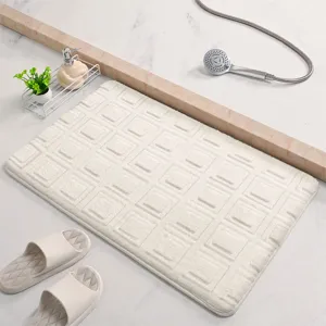 Thick memory foam bath mat, soft absorbent bathroom rug with anti-slip backing for floor.