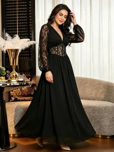 Elegant black lace long sleeve maxi dress featuring a V-neckline and fitted waist detail.
