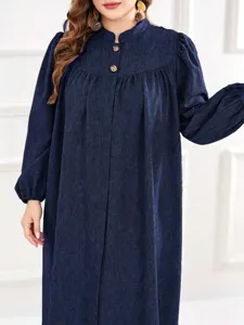 Close-up detail of the plus-size dark blue long sleeve maxi dress stand collar design.