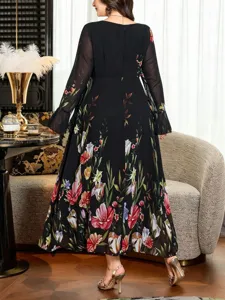 Plus size black floral maxi dress featuring elegant long flare sleeves and a chic square neckline.