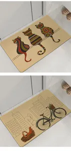 Non-slip floor mat with cute cat and city bicycle prints, durable absorbent doormat for home.