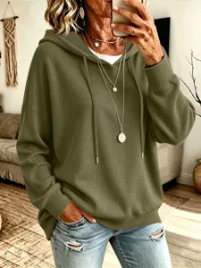 Einfarbiger Kapuzenpullover aus Strick mit Kordelzug und Tasche, lässiges Damen Oberteil loose.