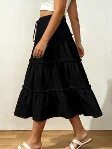 Black tiered midi skirt for women with elastic drawstring waist and lettuce edge.