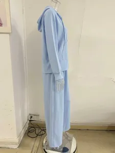 Light blue loose hooded cardigan set and wide-leg trousers casual two-piece tracksuit detail.