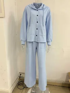 Light blue casual two-piece hooded cardigan and wide-leg trousers set for autumn