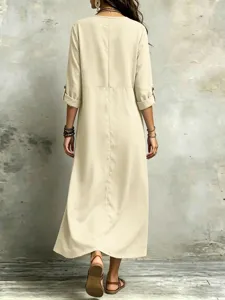 Casual loose long sleeve maxi dress with roll-up sleeves and vintage bohemian style details.