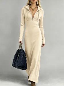 Ribbed knit hooded long dress detail, half zip closure, slim fit casual sweep style.