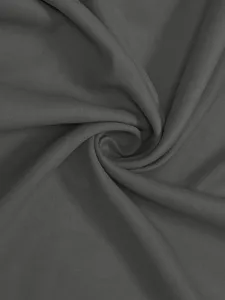 Dark grey twill fabric detail view showcasing soft texture, fine weave and elegant drape.