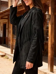 Close-up detail of the black fringe jacket featuring stylish tassels and retro design.