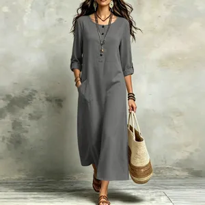 Casual vintage bohemian long dress for women, loose fit with roll-up sleeves and large pockets.
