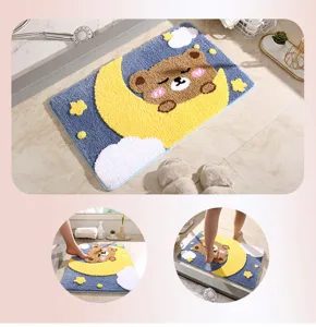 Cute cartoon bear moon bath mat detail showing soft fluffy absorbent floor rug texture and scene.