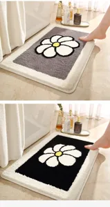 Fluffy bath mat with cute daisy flower design, soft plush and non-slip backing for bathroom.