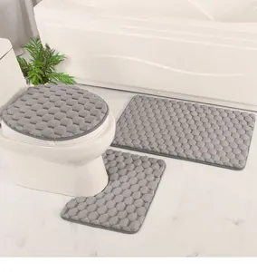 Conjunto de alfombrillas de baño de franela gris con esponja absorbente antideslizante para inodoro.