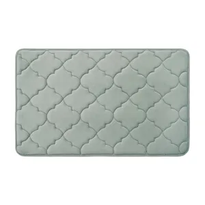 Thick coral velvet floor mat for living room bedroom and entryway with quatrefoil pattern.
