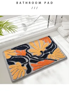 Bathroom anti-slip absorbent floor mat with abstract leaf pattern, thick tufted home carpet.