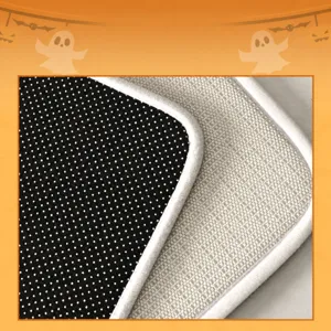 Halloween non-slip floor mat bottom backing close-up view showing durable stitched edges.