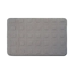 Grey memory foam bath mat with square waffle texture, non-slip backing, absorbent bathroom rug.