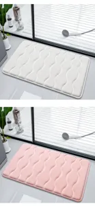 Thickened memory foam bathroom floor mat with simple embossed wavy design, non-slip.