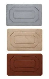Details view of three color options for soft absorbent bathroom mats with geometric designs.