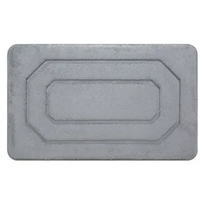 Grey absorbent bath mat with geometric design, non-slip backing for bathroom and bedroom use.