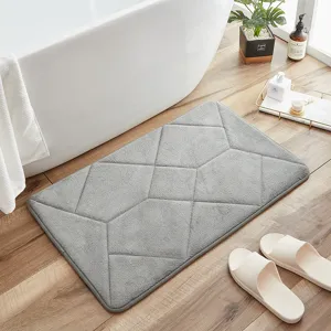 Gray memory foam bath mat with geometric design, ultra-absorbent and non-slip floor rug.