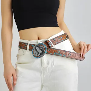 Retro bohemian style embossed leather waist belt detail showcasing vintage metal buckle.