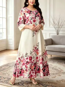 Detailed view of the elegant floral print long-sleeve maxi dress, featuring a loose and comfortable fit.