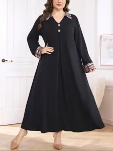 Plus size black maxi dress featuring classic plaid collar and cuffs, long sleeves, and elegant button front design.