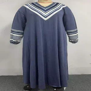 Detailed view of the women long sleeve V-neck geometric print casual loose maxi dress.