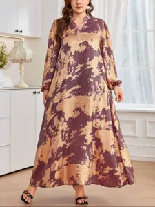 Elegant plus size loose long dress with abstract purple gold print for casual wear.