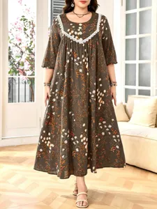 Elegantes Damen Maxikleid mit Blumenmuster, langen Ärmeln, weißer Spitze und Knöpfen.