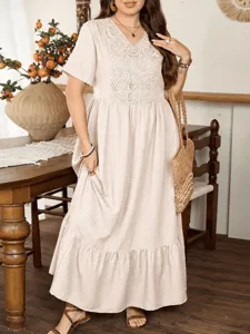 Plus size beige lace splicing tiered hem dress detailed lifestyle view for women.