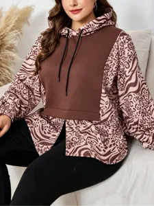 Plus size women hooded sweatshirt, chic abstract animal print design with solid brown chest panel.