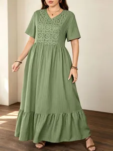 Green short sleeve maxi dress featuring lace piecing and tiered ruffle hem for women.