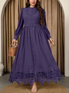 Detailed view of the elegant plus-size purple maxi dress with exquisite lace embroidery and belt.