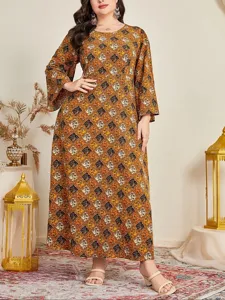 Detailed view of the plus size boho maxi dress with geometric print and elegant long sleeves.