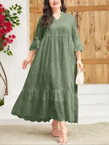 Plus size eyelet embroidered long dress detail, elegant v-neck design and loose fit style.